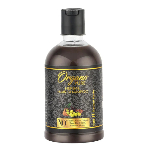 A bottle of Organo Pure Herbal Hair Shampoo with a black label and gold accents, highlighting its all-natural ingredients.